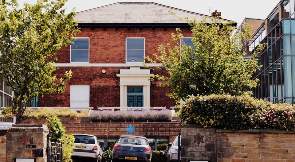 A brick villa behind a garden wall in Chapeltown, Leeds